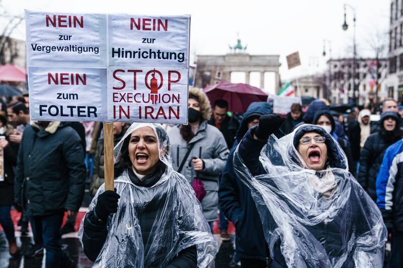 A sign in Berlin reads 'no to rape, no to torture, no to execution, stop execution in Iran'. EPA