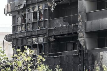 The remains of Zen Tower after a blaze swept through the Dubai Marina building on May 13, 2018. Antonie Robertson / The National