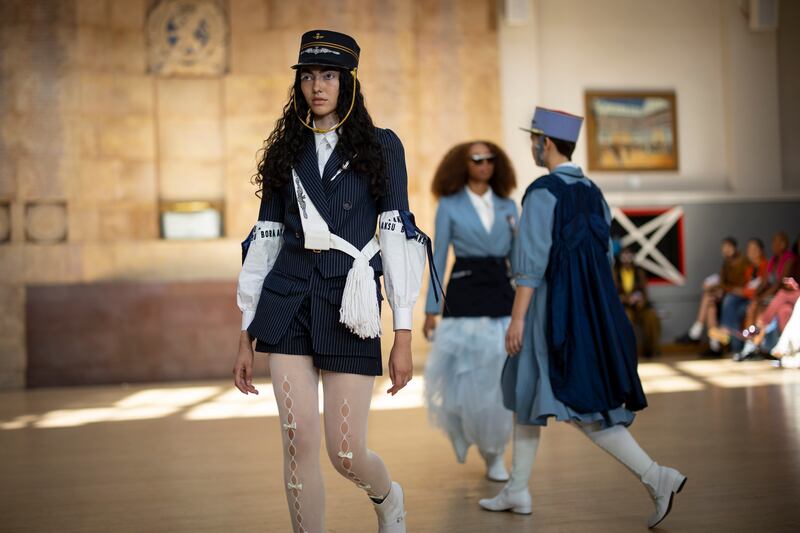 Bora Aksu's show also had touches of military uniform styles in a nod to the queen's troops. EPA