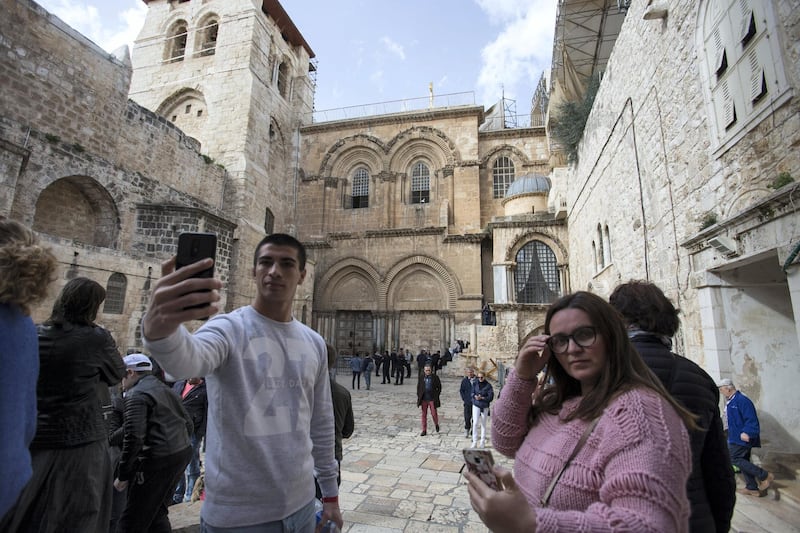 Christian pilgrims take selfies outside the closed  Church of the Holy Sepulchre in the Old City of Jerusalem on Monday February 26,2018.The Church of the Holy Sepulchre  remained closed for a second day after church leaders in Jerusalem closed it to protest against Israeli's announced plans by the cityÕs municipality earlier this month to collect property tax (arnona) from church-owned properties on which there are no houses of worship.
Nadal said he was in mourning for the state of Christians in the Holy Land and said he never in his life saw the church closed before .
(Photo by Heidi Levine for The National).