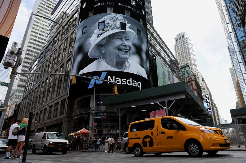 A tribute to Britain's Queen Elizabeth II appears on a Nasdaq hoarding in Times Square, New York, after she died aged 96. Reuters