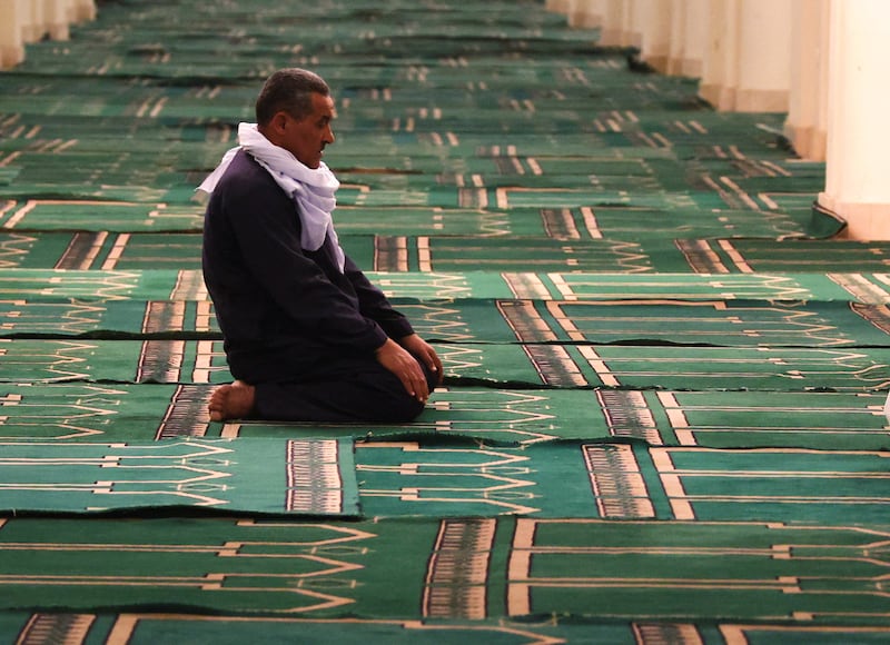 A man prays at the mosque. Reuters