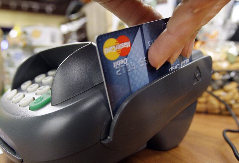 Credit card spending can stimulate the brain’s reward centre and drive you to make more purchases, according to a study. AP