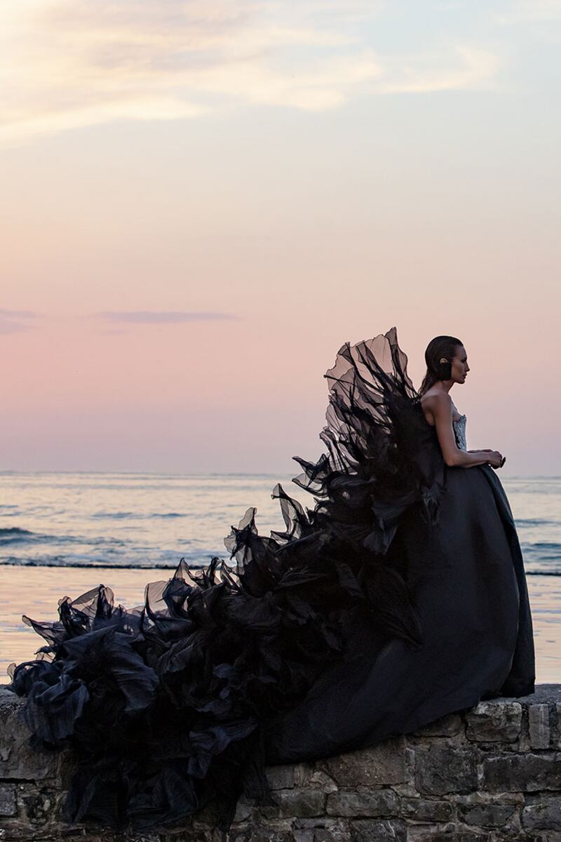 A silk faille gown arrived with a 'spine' of ruffles at Stephane Rolland for autumn / winter 2021.