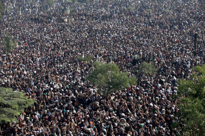 People gather to attend funeral services for Khadim Hussain Rizvi, leader of religious and political party Tehreek-e-Labaik Pakistan (TLP), at the Minar-e-Pakistan monument, Lahore.  Reuters