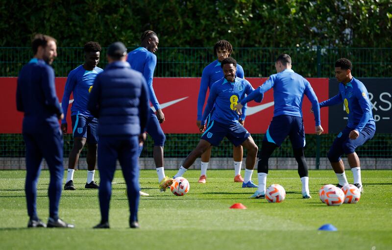 England's Raheem Sterling, Trent Alexander-Arnold and Jude Bellingham during training. Reuters