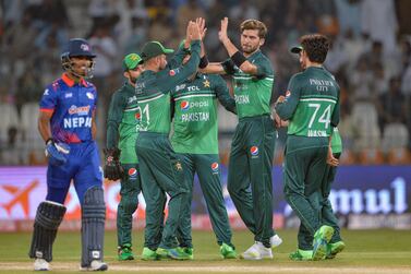 Pakistan's Shaheen Shah Afridi (2R) celebrates with teammates after taking the wicket of Nepal's captain Rohit Paudel (L) during the Asia Cup 2023 cricket match between Pakistan and Nepal at the Multan Cricket Stadium in Multan on August 30, 2023.  (Photo by Asif HASSAN  /  AFP)