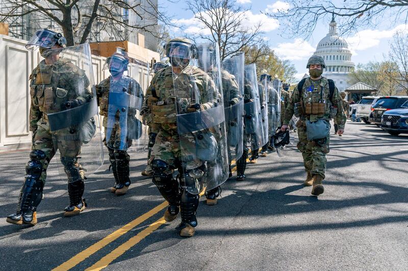 National Guard personnel leave the Capitol perimeter they were guarding, after a car crashed into a barrier on Capitol Hill, Washington, US, killing a police officer. AP Photo