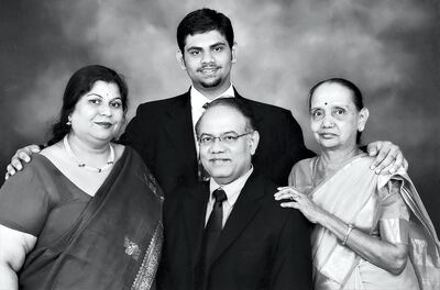 A passion for collecting runs in the family for Sunil Baboo, seated, with family including wife, Alpana (left). Courtesy Flint-Culture