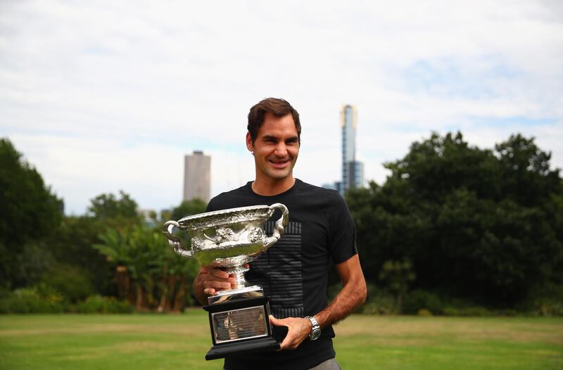 MELBOURNE, AUSTRALIA - JANUARY 29:  Roger Federer of Switzerland poses with the Norman Brookes Challenge Cup after winning the 2018 Australian Open Men's Singles Final, at Government House on January 29, 2018 in Melbourne, Australia.  (Photo by Clive Brunskill/Getty Images)