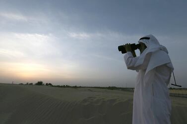 Saudi Arabia's Supreme Court has called on people to watch for the crescent moon on Sunday. Pawan Singh / The National