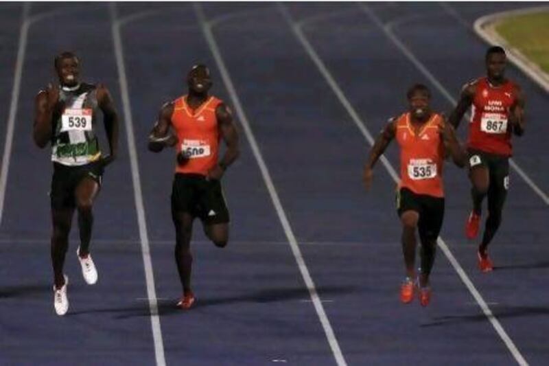 It will not be easy for Usain Bolt, left, at this Olympics with Yohan Blake, second right, and others capable of running under 10 seconds.