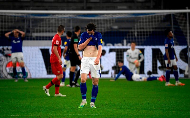 Schalke forward Michael Gregoritsch looks dejected after Leverkusen's goal. AFP