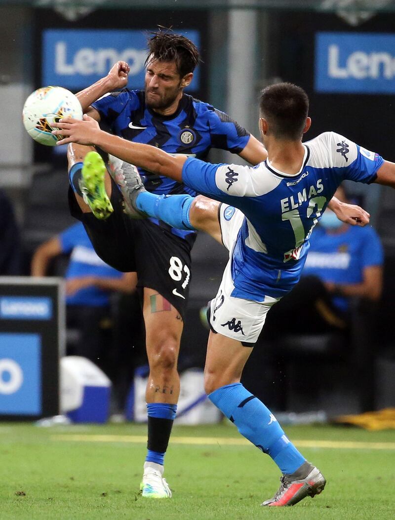 Inter Milan's Antonio Candreva and Napoli's Elif Elmas in action. EPA