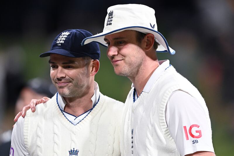 England's England's James Anderson, left, and Stuart Broad pose after becoming the most successful bowling pair. AP