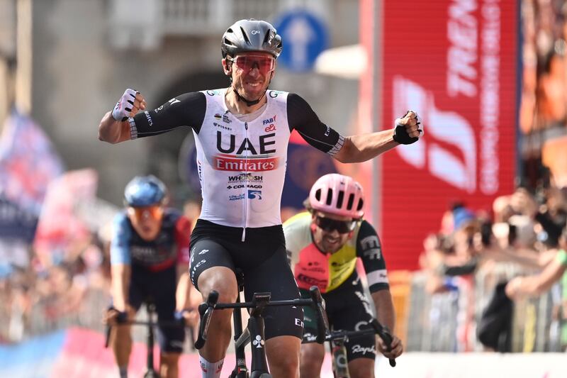 Brandon McNulty, of UAE Team Emirates, celebrates after winning Stage 15 of the Giro D'Italia on May 21, 2023. AP