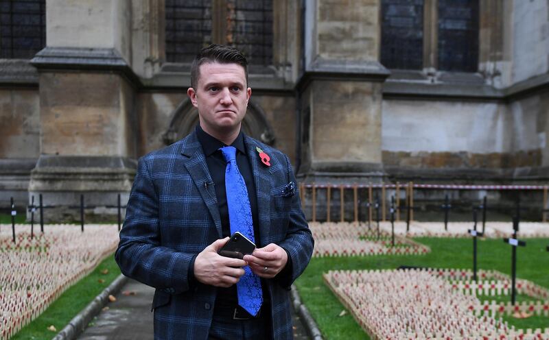 epa07145465 Far right activist, known as Tommy Robinson, (Stephen Christopher Yaxley-Lennon) visits Westminster Abbey's Field of Remembrance ahead of Armistice Day in central London, Britain, 06 November 2018. Armistice Day is on 11 November.  EPA/ANDY RAIN