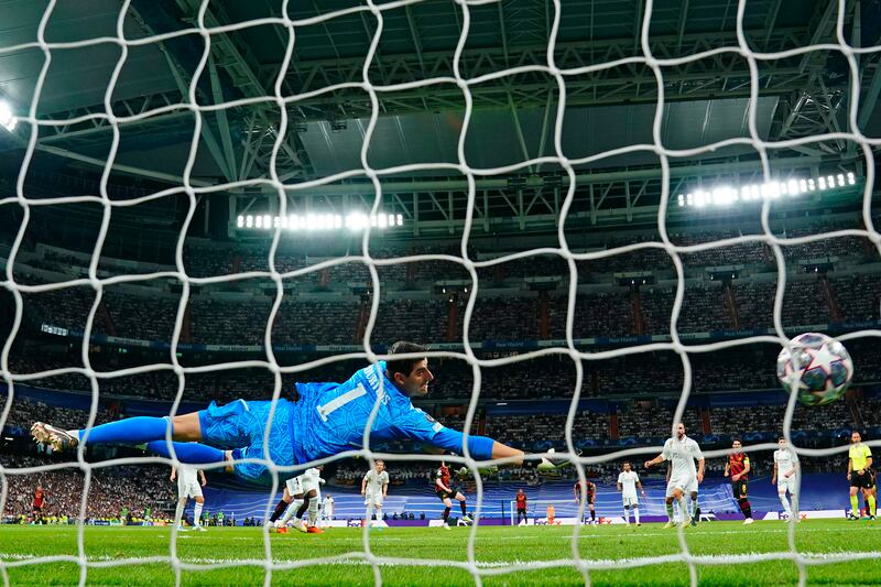 Real Madrid goalkeeper Thibaut Courtois is beaten by Kevin De Bruyne strike to equalise for Manchester City. AP 