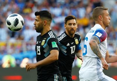 Soccer Football - World Cup - Group D - Argentina vs Iceland - Spartak Stadium, Moscow, Russia - June 16, 2018   Argentina's Sergio Aguero and Lionel Messi in action with Iceland's Ragnar Sigurdsson      REUTERS/Kai Pfaffenbach