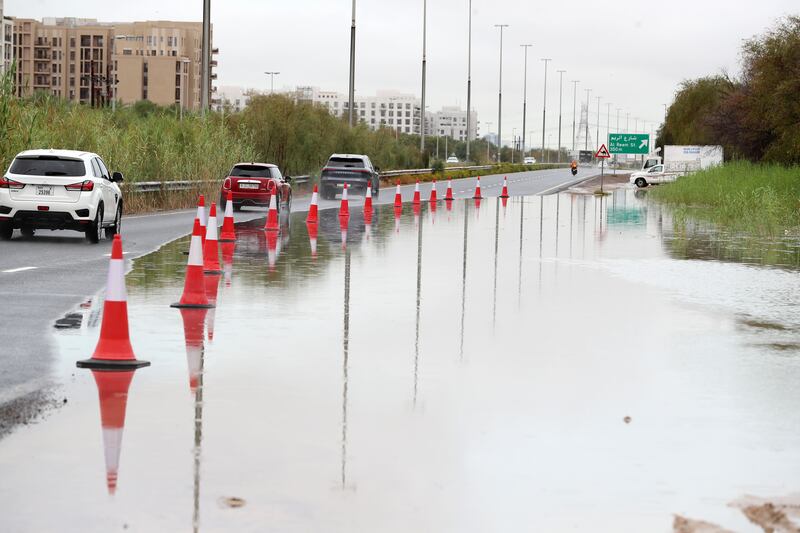 A flooded section of road marked off in Dubai. Chris Whiteoak / The National