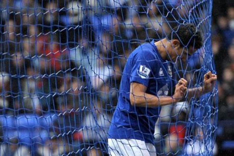 Everton’s Tim Cahill cuts a forlorn figure during Sunday’s 2-0 defeat at Bolton. It was a result which left David Moyes, the long-serving coach of the Merseyside club, in a miserable mood.