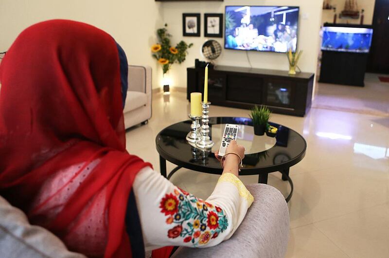 Rabia Ali admits to spending much of her day sitting in front of the TV, a common pursuit for many UAE residents. Fatima Al Marzooqi / The National