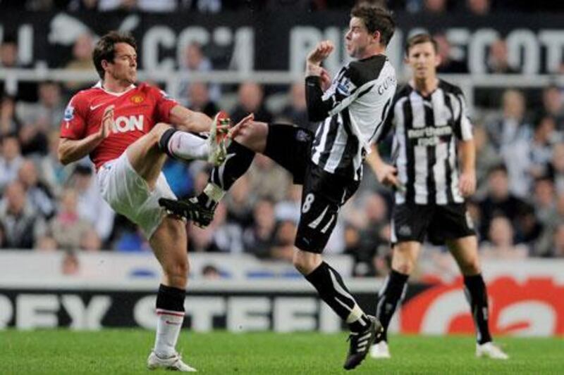Michael Owen, of Manchester United, left, did not get a warm reception on his return to Newcastle.