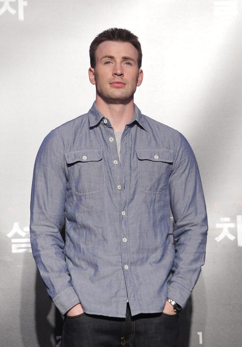 SEOUL, SOUTH KOREA - JULY 29:  Actor Chris Evans attends the 'Snowpiercer' press conference at Conrad Hotel on July 29, 2013 in Seoul, South Korea. The film will open in South Korea on August 1.  (Photo by Chung Sung-Jun/Getty Images) *** Local Caption ***  AL06AU-HOLLYBOLLY-EVANS.jpg