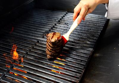 Dubai, United Arab Emirates- June 21,  2011:   Step 4 :   Cooking the  Beef on the Grill  .  ( Satish Kumar / The National )  For Arts & Life 

Dubai, United Arab Emirates- June 21,  2011: Chef Ana Maria Gasperi of the Rib Room Restaurant at the Jumierah Emirates Towers in Dubai shows the step-by-step for Beef Wellington  ( Satish Kumar / The National )  For Arts & Life