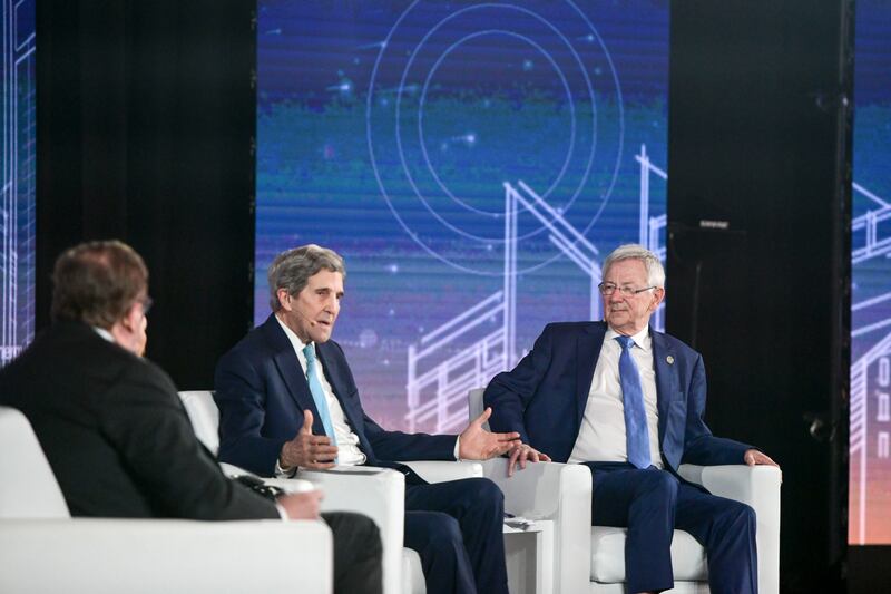 John Kerry, special US climate envoy, and Andrew Steer, president and chief executive of the Bezos Earth Fund, during a panel discussion at the Atlantic Council Global Energy Forum. Khushnum Bhandari / The National