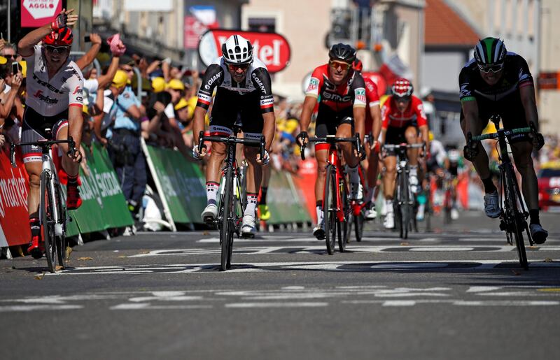 REFILE - QUALITY REPEAT Cycling - The 104th Tour de France cycling race - The 165-km Stage 16 from Le Puy-en-Velay to Romans-sur-Isere, France - July 18, 2017 - Trek-Segafredo rider John Degenkolb of Germany, Team Sunweb rider Michael Matthews of Australia and Dimension Data rider Edvald Boasson Hagen of Norway sprint towards the line. REUTERS/Christian Hartmann