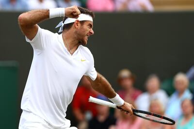 LONDON, ENGLAND - JULY 09: Juan Martin Del Potro of Argentina celebrates winning the second set against Gilles Simon of France on day seven of the Wimbledon Lawn Tennis Championships at All England Lawn Tennis and Croquet Club on July 9, 2018 in London, England.  (Photo by Matthew Stockman/Getty Images)