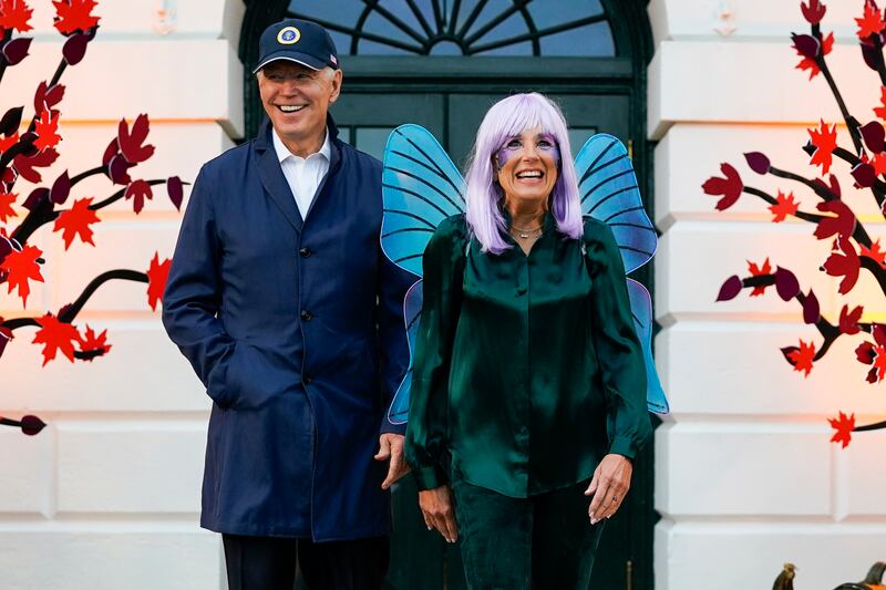 President Joe Biden and first lady Jill Biden arrive to give treats to trick-or-treaters on the South Lawn of the White House, on Halloween. AP Photo