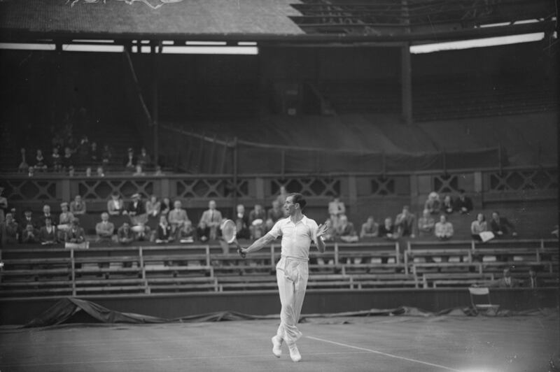 British tennis player D W Butler in action on Centre Court in 1946, during the first Championships at Wimbledon since the Second World War.