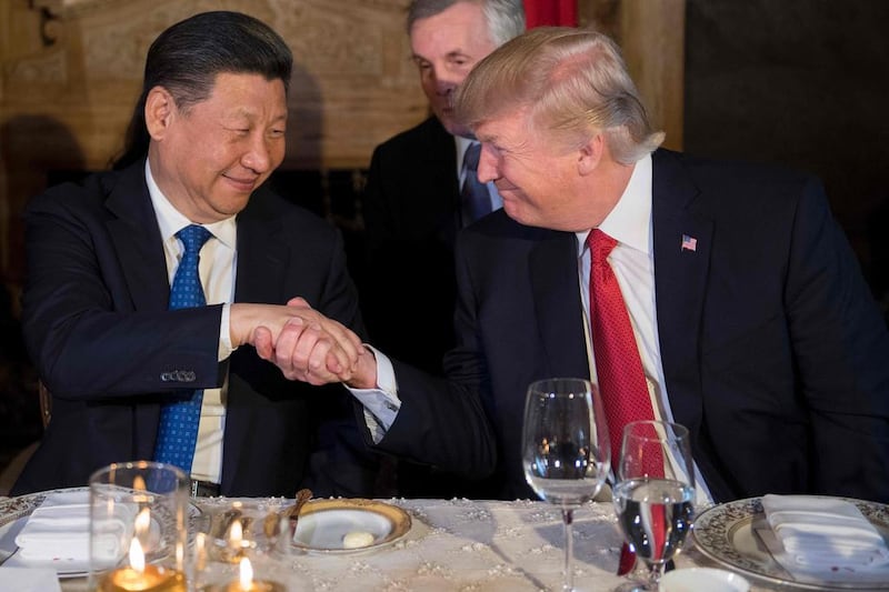 Donald Trump met with the Xi Jinping when the Chinese president visited the US. Jim Watson / AFP
