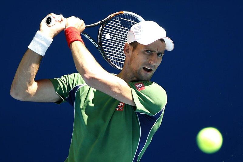 Novak Djokovic will open the Australian Open against Lukas Lacko of Slovakia. Eugene Hoshiko / AP