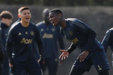 Manchester United's Paul Pogba, right, and Marcos Rojo during training Action Images via Reuters/Lee Smith