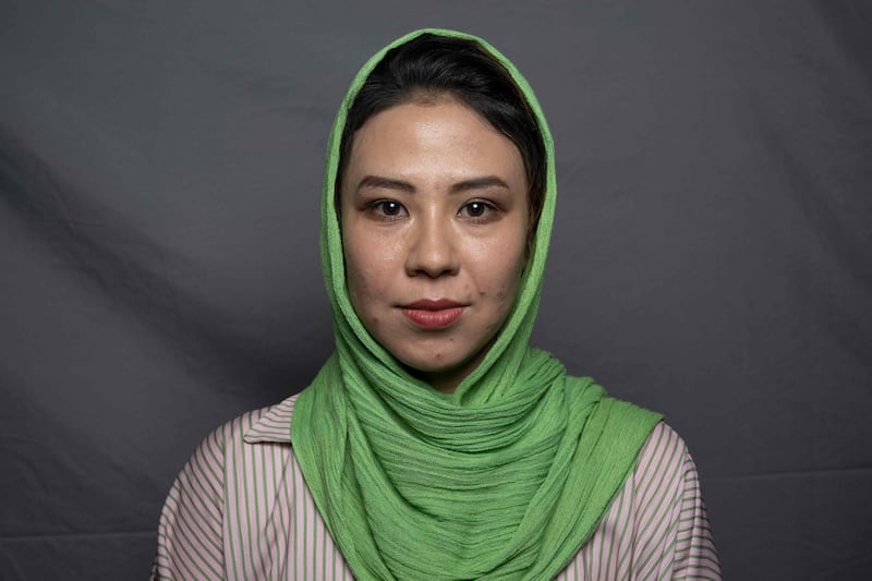 Mathematics and robotics teacher Sumaya Sultani, 27, poses for a portrait in Herat. 'Before the collapse, I participated in international technology events, and I used to work late nights on various projects and coach the Afghan girls’ robotics team. But after the Taliban takeover, everything we worked for and achieved turned to dust.'