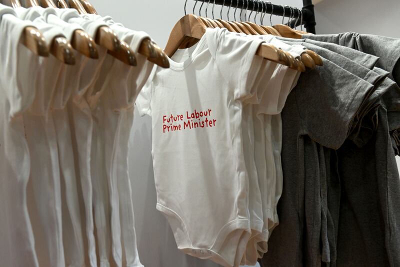 Baby clothes with Labour slogans. Bloomberg