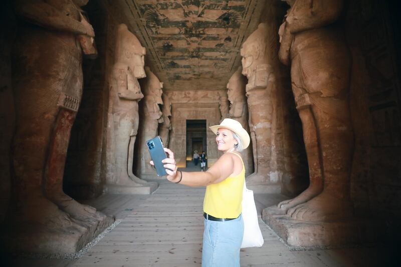 People visit the Ramses II temple in Abu Simbel, Egypt, amid the negative impact of the Covid-19 pandemic on the country's tourism sector. EPA