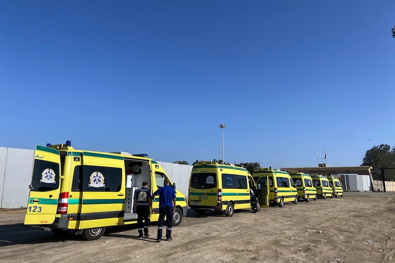 Ambulances queue at the Rafah border as they wait to cross into Gaza to transport the injured back to Egypt for treatment. Getty Images