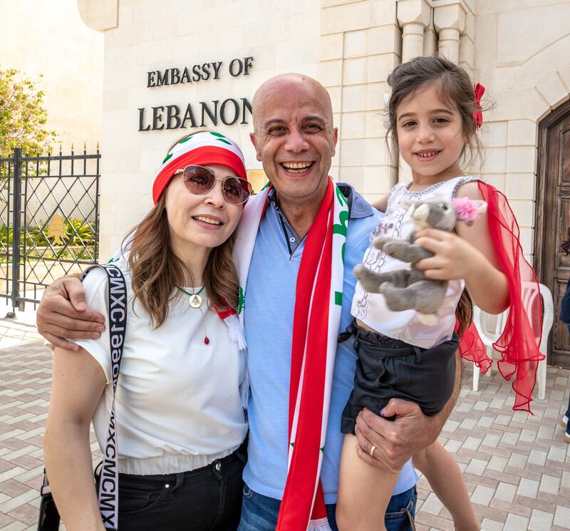 Abeer Hassan and Samir Kamal with daughter
Lynn after casting their votes at the Embassy of Lebanon in Abu Dhabi. Victor Besa / The National