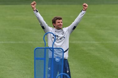 Bayern Munich's striker Thomas Mueller reacts during a training session at the football team's training grounds in Munich, southern Germany, on May 5, 2020. German authorities are expected to decide on May 6, 2020 whether to allow the Bundesliga to resume, making it the first league to restart in Europe, behind closed doors and on the basis of a draconian health protocol. / AFP / Christof STACHE