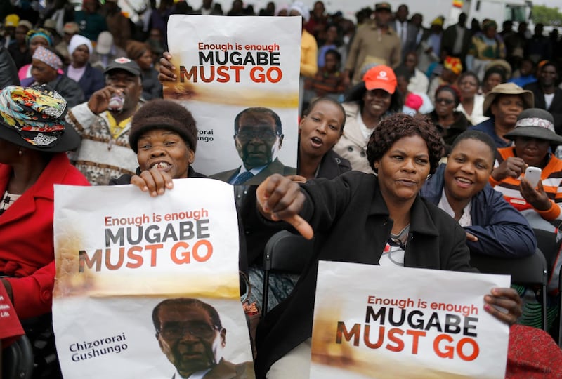 People taking to the streets as part of the mass action protests against president Robert Mugabe, in Harare. Kim Ludbrook / EPA