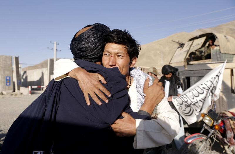 Alleged Taliban militant greets people as a group of Taliban visits  people as a goodwill gesture amid a three-day ceasefire  on second day of Eid al-Fitr, in Kabul, Afghanistan, on June 16, 2018. Hedayatullah Amid / EPA