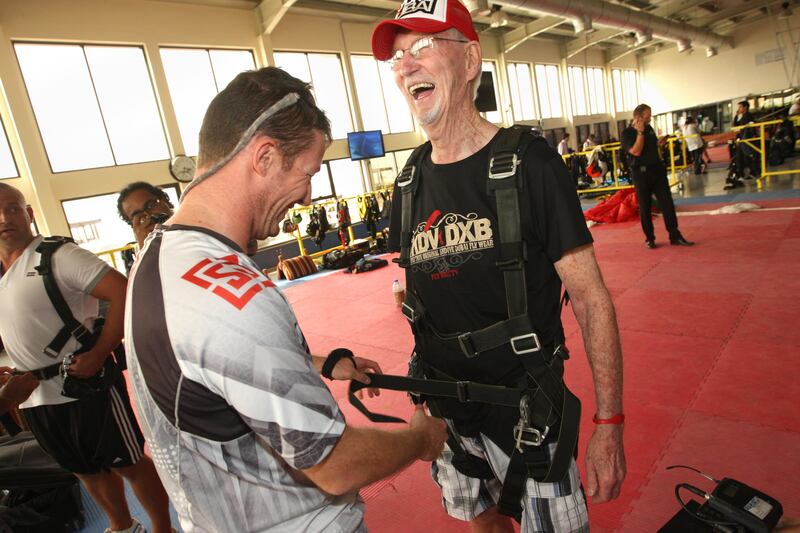 Dubai, United Arab Emirates, Apr 10, 2013 -  Dick Corbit, right, prepares for his parachute jump. Corbit is the oldest jumper to skydive at skydive Dubai and today is his 86 birthay. ( Jaime Puebla / The National Newspaper ) 