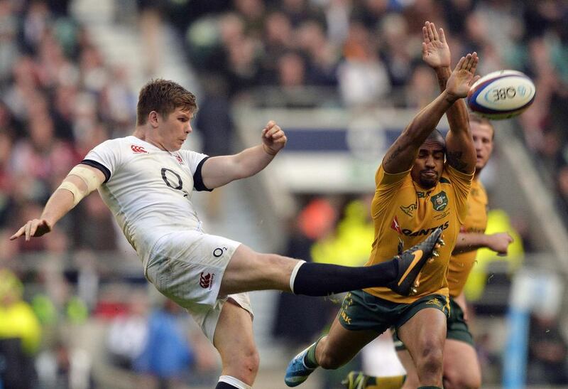Owen Farrell, left, had a try, two conversions and a pair of penalties to rally England past Australia. Toby Melville / Reuters

