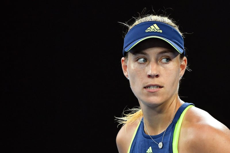 epa06456365 Angelique Kerber of Germany reacts during her third round match against Maria Sharapova of Russia at the Australian Open Grand Slam tennis tournament in Melbourne, Australia, 20 January 2018.  EPA/JOE CASTRO AUSTRALIA AND NEW ZEALAND OUT