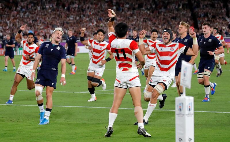 Japan's Kenki Fukuoka celebrates after scoring his team's third try. AP Photo