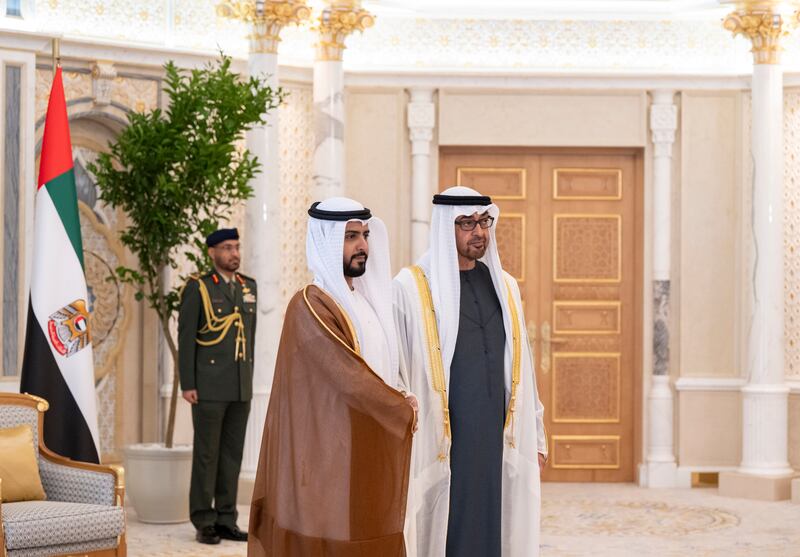 President Sheikh Mohamed stands with Fahd Al Ameri, UAE ambassador to Bahrain
